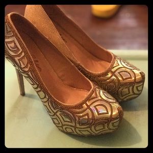 Gold studded heels